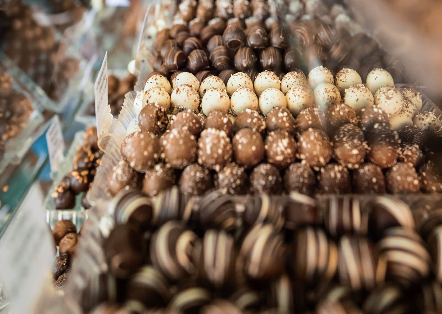 Assorted chocolate truffles on a display stand