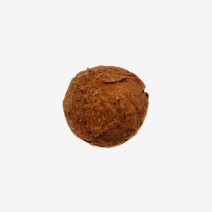 Brown truffle on a white background